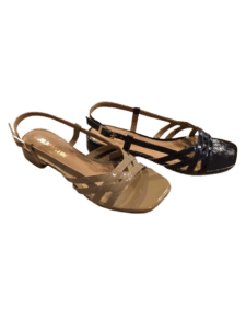 Sandales JB Martin à brides croisées en cuir verni beige et noir, bout carré et petit talon élégant.